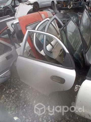 Mazda artis 99 puerta trasera izquierda envio regs