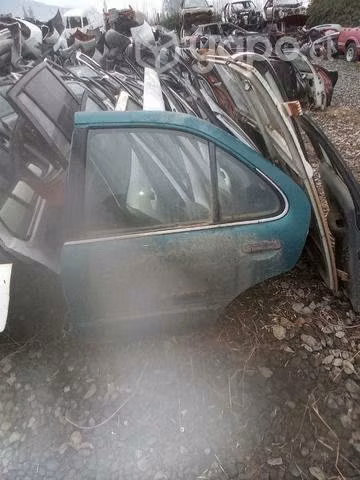 Nissan sentra 2 puerta trasera izquierda envio reg