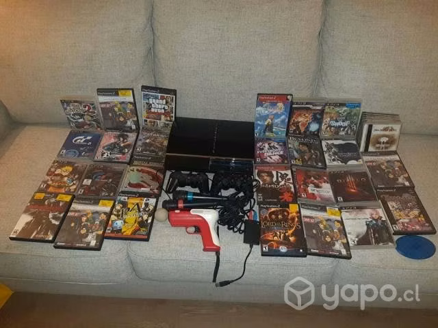Play station 3 con accesorios y 26 juegos