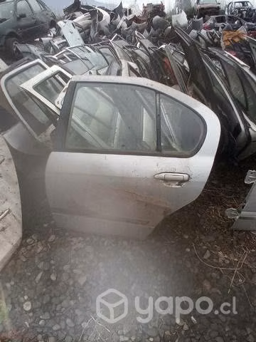 Nissan primera 99 puerta trasera izquierda envio
