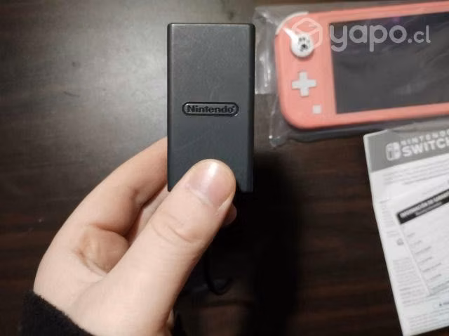 Se vende nintendo switch lite color rosado + 2 jue