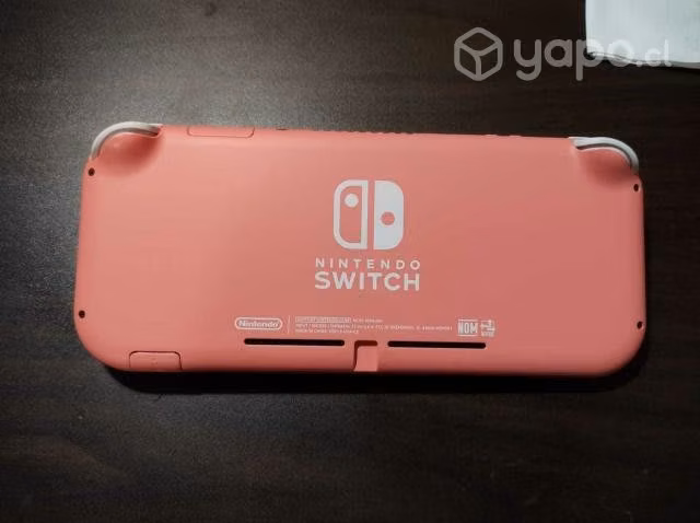 Se vende nintendo switch lite color rosado + 2 jue