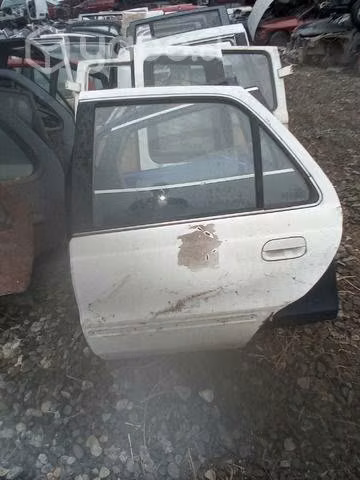 Hyundai elantra 93 puerta trasera izquierda envio