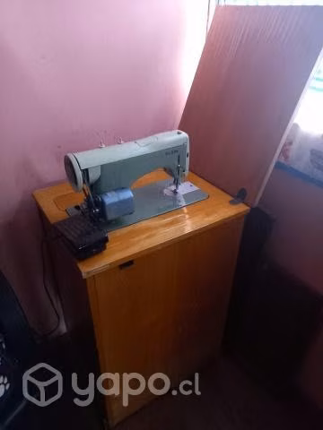 Maquina de coser Elguin