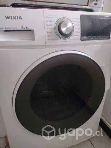 lavadora secadora casi nueva . Por apuro