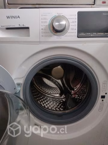 lavadora secadora casi nueva . Por apuro