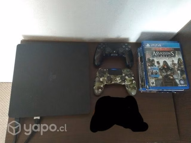 ps4 a 350.000 con 2 mandos y 8 juegos