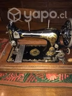 Maquina de coser- Selecta