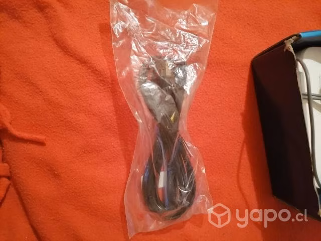 Un router con todos sus accesorios y su caja.