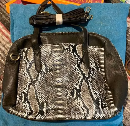 Cartera animal print nueva
