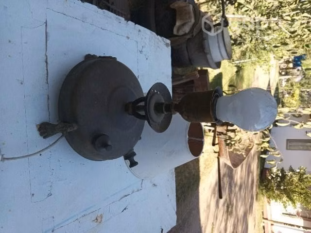 Antiguo quemador de bronce