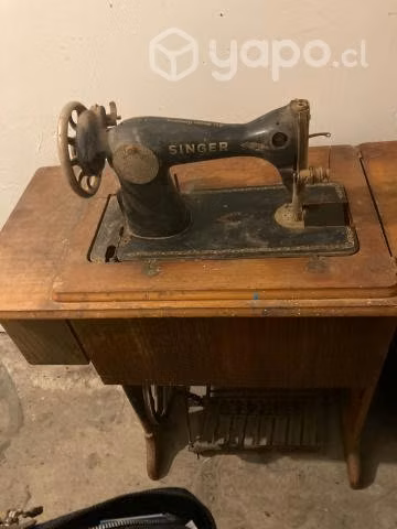 Máquina de coser singer antigua