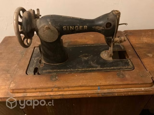 Máquina de coser singer antigua