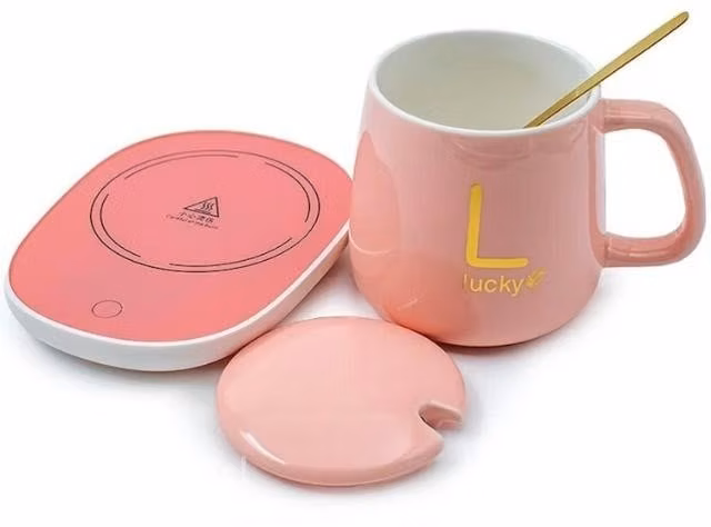 Taza hervidora color rosada y blanca