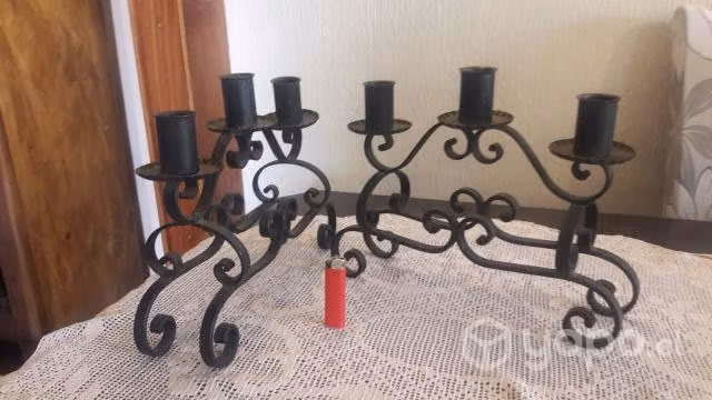 Par de antiguos candelabros de fierro forjado