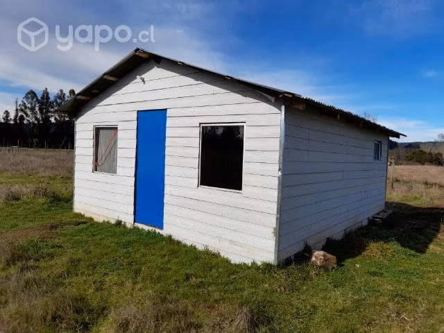 Parcela con casa