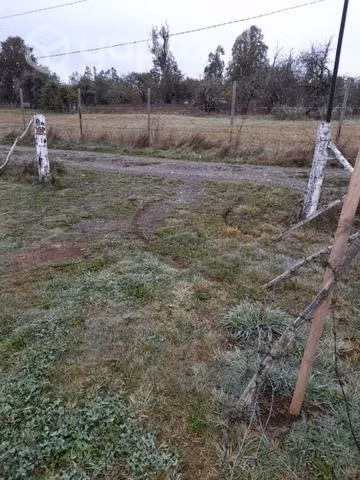 Parcela con casa