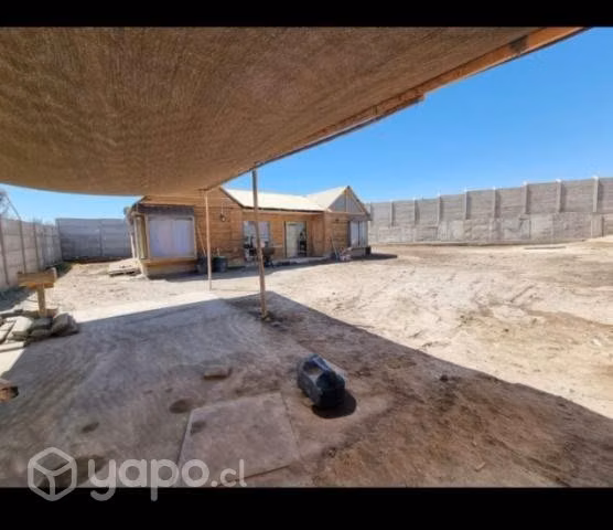 Terreno con casa