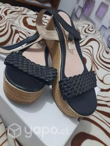 En venta por motivo de viaje