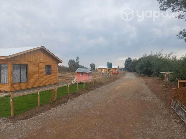 terreno con 2 casas