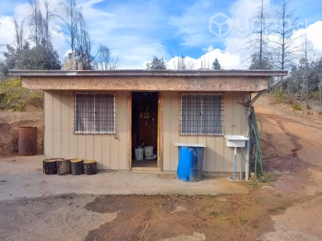 Terreno con vivienda en Colico Alto, Santa J