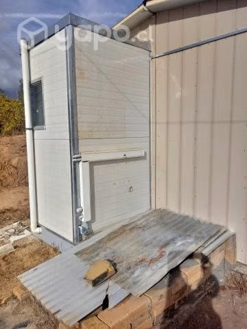 Terreno con vivienda en Colico Alto, Santa J