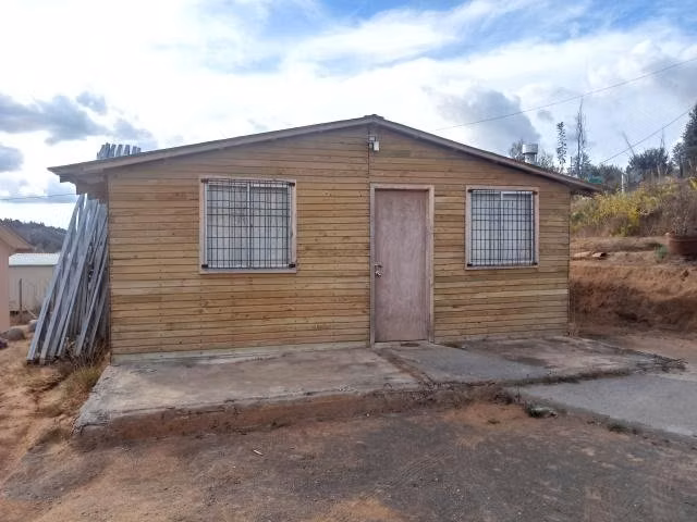 Terreno con vivienda en Colico Alto, Santa J