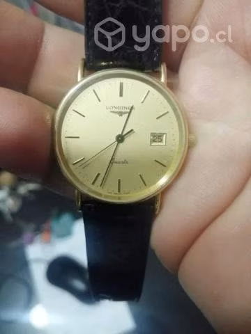 Reloj longines oro.   o permuto