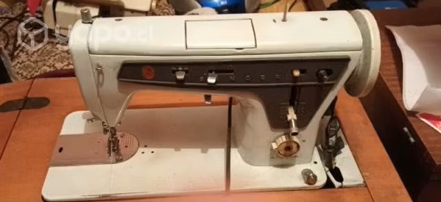 Maquina de coser Singer