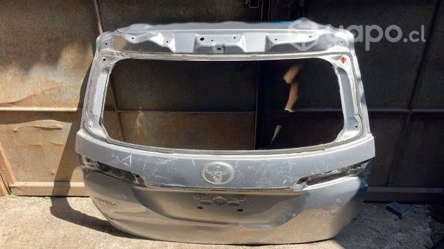 Portalon toyota fortuner gris plata original