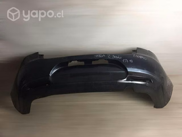 Parachoque trasero Mazda 2 sedan 2007-2010