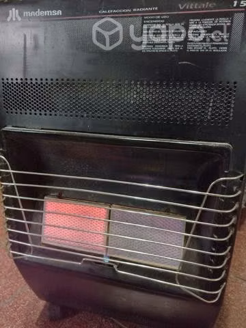 Calefactor a gas funcionando con regulador