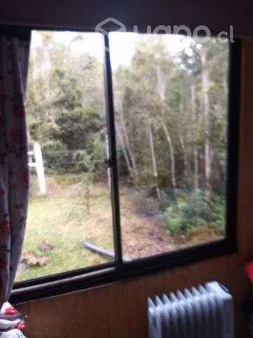 Terreno con casa