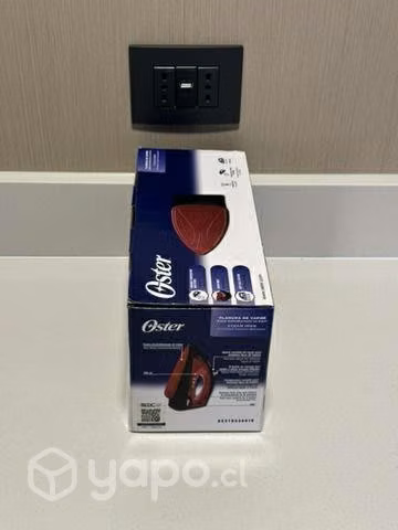 Plancha ropa a vapor Oster suela antiadherente