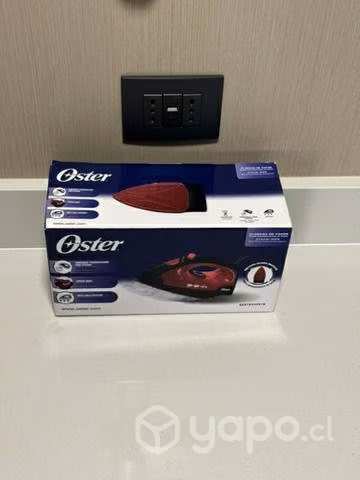 Plancha ropa a vapor Oster suela antiadherente