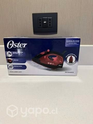 Plancha ropa a vapor Oster suela antiadherente