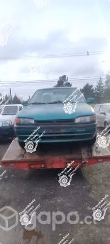 Ópticos mazda 323 año 1997