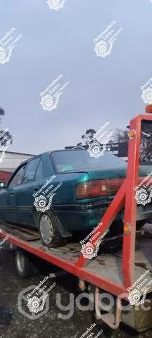 Puerta trasera izquierda mazda 323 año 1997