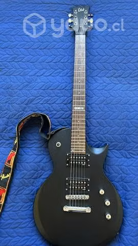 Guitarra eléctrica LTD con amplificador Marshall