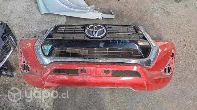 Parachoque+mascara+logo hilux revo 2022-2023 orig
