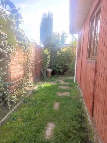 ¡Encantadora casa en Curicó con patio en L y más