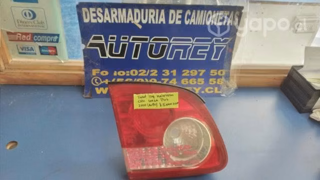 Farol izquierdo maletero Chevrolet Corsa Plus ( Au