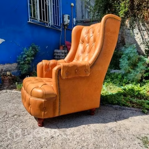 Bergere tudor asiento capitoné