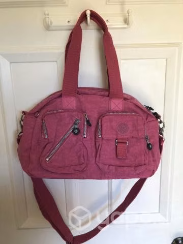 Cartera Kipling