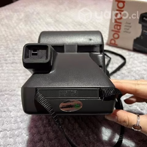 One step Polaroid Camara
