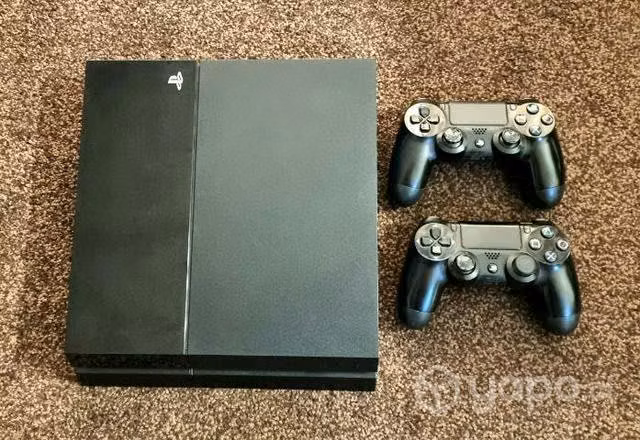 Playstation 4 + 2 controles + 15 juegos