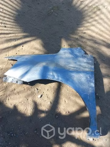 Tapabarro izquierdo chevrolet sonic del 12 al 13