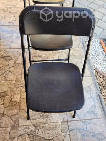 Tres sillas plegables