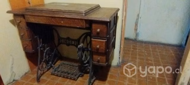 Máquina de coser ,singer antigua.