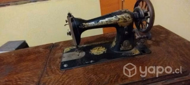 Máquina de coser ,singer antigua.